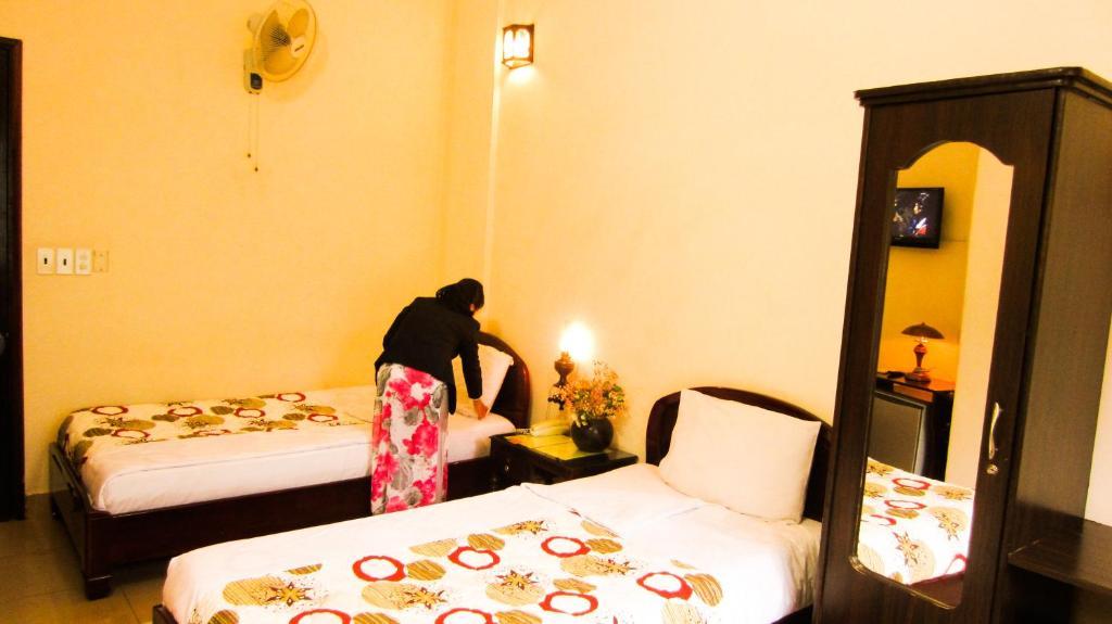 Binh Minh Sunrise Hue Hotel Стая снимка